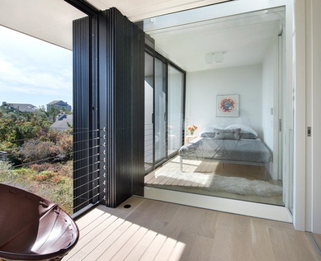 Hamptons house, country house, waterfront, NY waterfront, flood-resistant house, floods, water-resistant house, Bates Masi Architects, New York architecture, glass walls, FEMA, green architecture, daylit architecture