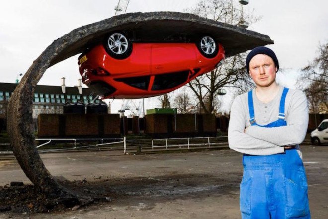 Alex Chinneck, gravity-defying artwork, art installation, ‘Pick yourself up and pull yourself together,’ Vauxhall Motors, Vauxhall Corsa, illusory artwork, tarmac, temporary art,