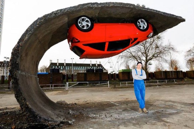 Alex Chinneck, gravity-defying artwork, art installation, ‘Pick yourself up and pull yourself together,’ Vauxhall Motors, Vauxhall Corsa, illusory artwork, tarmac, temporary art,