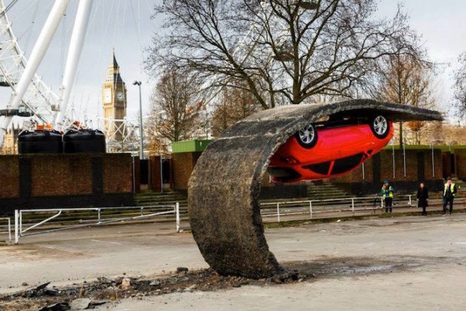 Alex Chinneck, gravity-defying artwork, art installation, ‘Pick yourself up and pull yourself together,’ Vauxhall Motors, Vauxhall Corsa, illusory artwork, tarmac, temporary art,