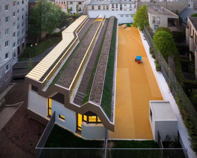 the paper nursery, wild rabbits architects, paris, france, french architecture, paris nursery school, paris nursery, childrens spaces, hidden building, rooftop garden, rooftop grass, good use of natural light, interior glass doors for light, vladimir doray
