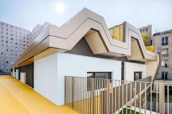the paper nursery, wild rabbits architects, paris, france, french architecture, paris nursery school, paris nursery, childrens spaces, hidden building, rooftop garden, rooftop grass, good use of natural light, interior glass doors for light, vladimir doray