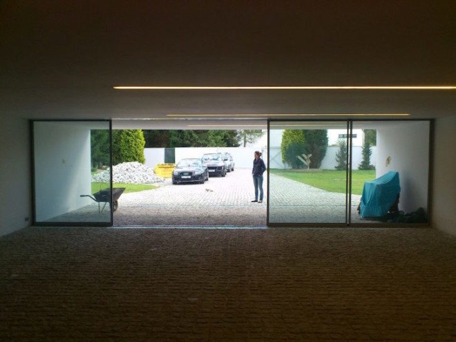 Auto family house, KWK Promes, Poland, drive thru art gallery, automobiles, car, eco-friendly car, green roof, modern home, art gallery, cantilever