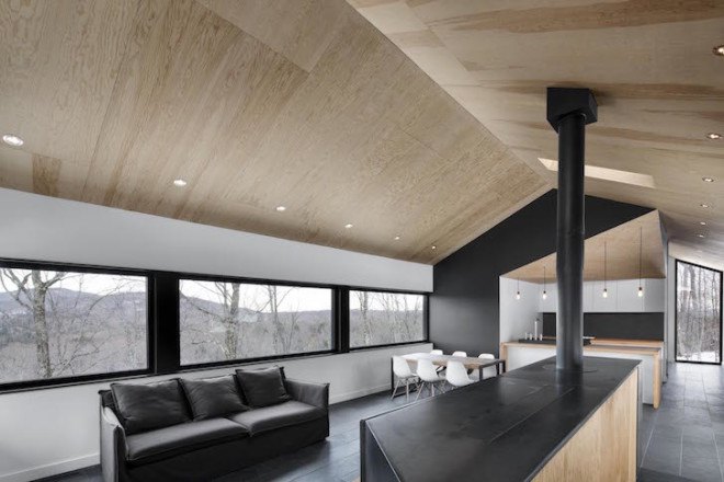 Bolton Residence, mnimalist cabin, cabin, Quebec, Naturehumaine, locally sourced material, timber frame, passive ventilation, slow-combustion fireplace, Eastern Townships, natural plateau, gabled, cantilevered, Bolton Residence by Naturehumaine