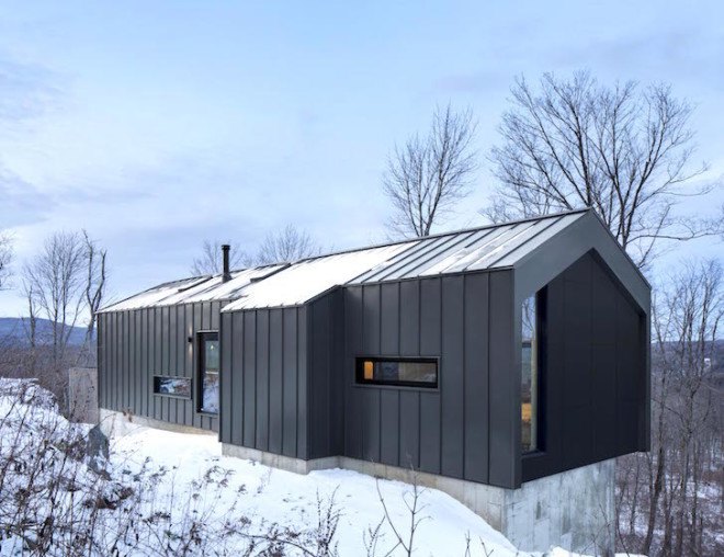 Bolton Residence, mnimalist cabin, cabin, Quebec, Naturehumaine, locally sourced material, timber frame, passive ventilation, slow-combustion fireplace, Eastern Townships, natural plateau, gabled, cantilevered, Bolton Residence by Naturehumaine