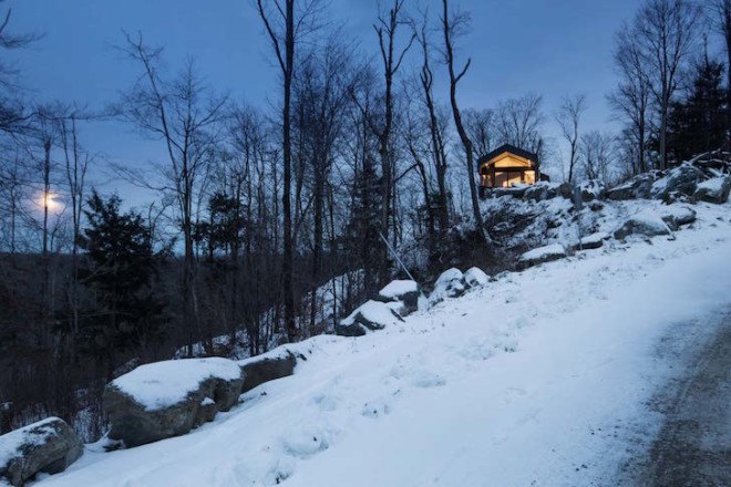 Bolton Residence, mnimalist cabin, cabin, Quebec, Naturehumaine, locally sourced material, timber frame, passive ventilation, slow-combustion fireplace, Eastern Townships, natural plateau, gabled, cantilevered, Bolton Residence by Naturehumaine