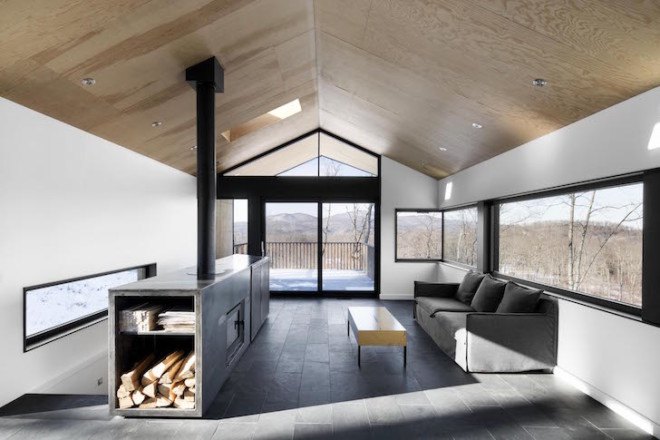 Bolton Residence, mnimalist cabin, cabin, Quebec, Naturehumaine, locally sourced material, timber frame, passive ventilation, slow-combustion fireplace, Eastern Townships, natural plateau, gabled, cantilevered, Bolton Residence by Naturehumaine