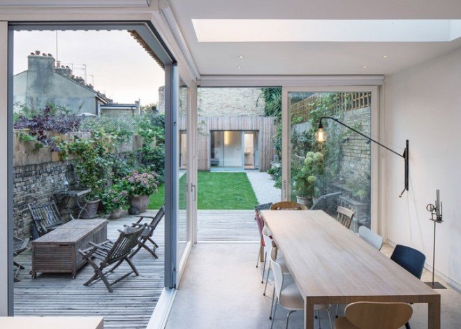 Haptic Architects, Victorian house, London, London architects, green renovation, green extension, untreated timber, timber facade, wooden facade, wooden cladding, skylights, wooden stairs, concrete fireplace