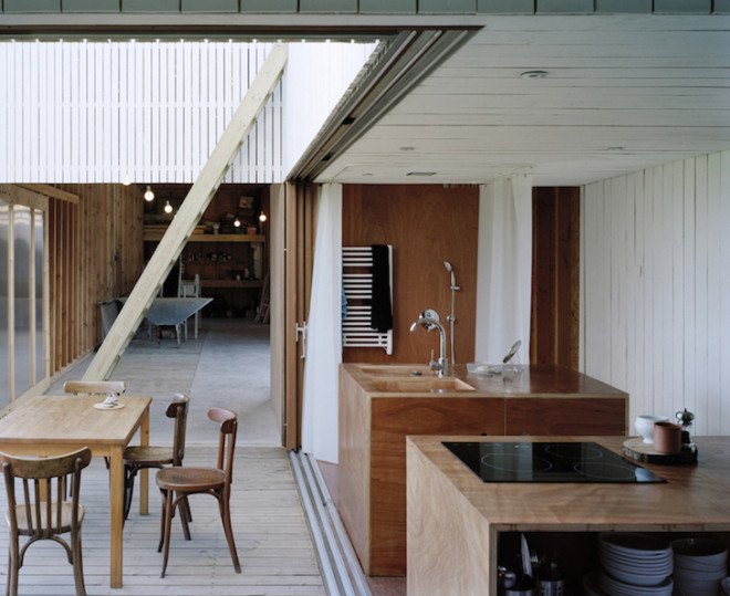Raum architects, oyster shack, oyster hangar, France, Bretagne, oyster house, timber frame, black stained timber, white timber, minimalist, minimalist design, oyster farmer, green roof