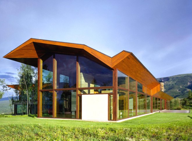 sandstone, black walnut, Wildcat Ridge Residence, Voorsanger Architects, Aspen, Colorado, geothermal energy, geothermal well, floor to ceiling glass, panoramic views, mountains, mountain ridge, Rocky mountains, moss rock wall