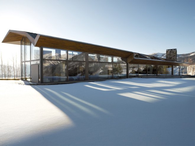 sandstone, black walnut, Wildcat Ridge Residence, Voorsanger Architects, Aspen, Colorado, geothermal energy, geothermal well, floor to ceiling glass, panoramic views, mountains, mountain ridge, Rocky mountains, moss rock wall