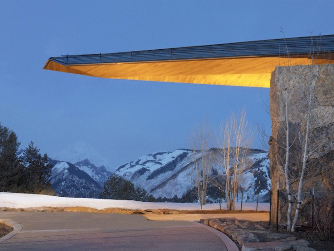 sandstone, black walnut, Wildcat Ridge Residence, Voorsanger Architects, Aspen, Colorado, geothermal energy, geothermal well, floor to ceiling glass, panoramic views, mountains, mountain ridge, Rocky mountains, moss rock wall