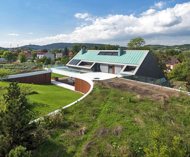 Edge House, Mobius Architecture, terrace, cantilever, Krakow, Poland, pitched roof, stone and timber, stone house, lime rock, family house, green architecture