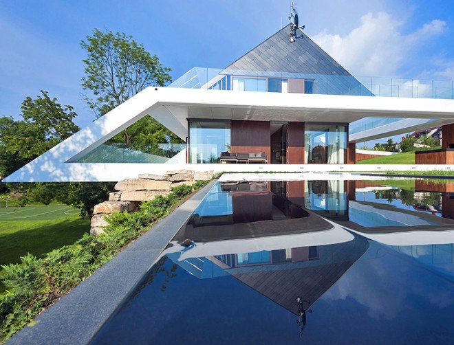 Edge House, Mobius Architecture, terrace, cantilever, Krakow, Poland, pitched roof, stone and timber, stone house, lime rock, family house, green architecture