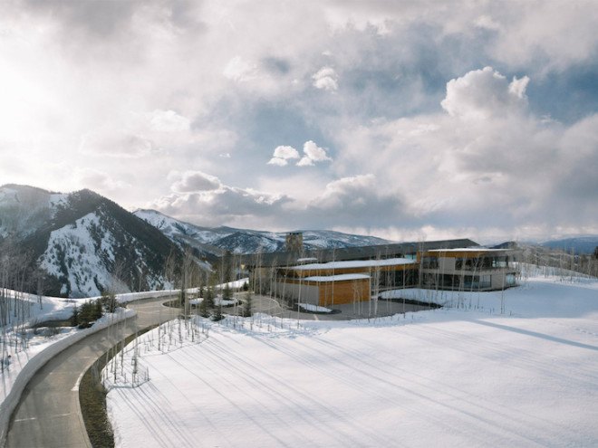 sandstone, black walnut, Wildcat Ridge Residence, Voorsanger Architects, Aspen, Colorado, geothermal energy, geothermal well, floor to ceiling glass, panoramic views, mountains, mountain ridge, Rocky mountains, moss rock wall