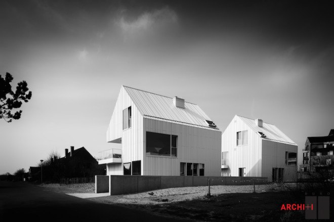 Blanco Oostduinkerke Residence, BURO II & ARCHI+I, Belgium, aluminum cladding, vernacular, pitched house, marionettes, dune grasses, coastal architecture, contemporary coastal architecture, daylighting, sustainable design, green design, sustainable materials, minimalist design