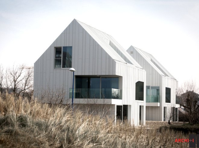 Blanco Oostduinkerke Residence, BURO II & ARCHI+I, Belgium, aluminum cladding, vernacular, pitched house, marionettes, dune grasses, coastal architecture, contemporary coastal architecture, daylighting, sustainable design, green design, sustainable materials, minimalist design