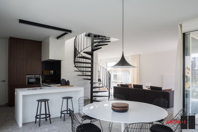 Blanco Oostduinkerke Residence, BURO II & ARCHI+I, Belgium, aluminum cladding, vernacular, pitched house, marionettes, dune grasses, coastal architecture, contemporary coastal architecture, daylighting, sustainable design, green design, sustainable materials, minimalist design