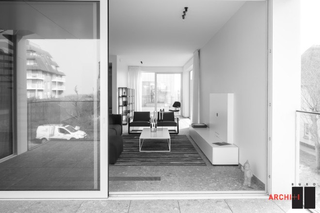 Blanco Oostduinkerke Residence, BURO II & ARCHI+I, Belgium, aluminum cladding, vernacular, pitched house, marionettes, dune grasses, coastal architecture, contemporary coastal architecture, daylighting, sustainable design, green design, sustainable materials, minimalist design