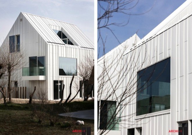 Blanco Oostduinkerke Residence, BURO II & ARCHI+I, Belgium, aluminum cladding, vernacular, pitched house, marionettes, dune grasses, coastal architecture, contemporary coastal architecture, daylighting, sustainable design, green design, sustainable materials, minimalist design