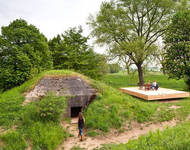 bomb shelter, converted bomb shelter, wartime bunker, bunker, concrete bunker, B-ILD, Bunker pavilion by b-ILD, Cabanon de Vancances, Le Corbusier, Fort Vuren, holiday home, vacation home, the netherlands, MERANTI plywood,