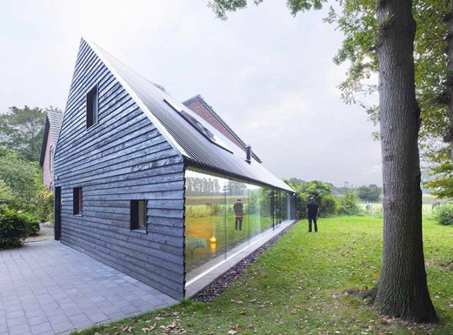 Barend Koolhaas, BK, triangular-plan house, House in Almen, energy-efficient, Dutch architecture, open plan interiors, natural light, rural views, glazed skin, heat exchanger