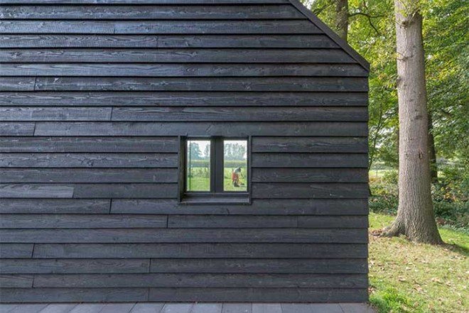 Barend Koolhaas, BK, triangular-plan house, House in Almen, energy-efficient, Dutch architecture, open plan interiors, natural light, rural views, glazed skin, heat exchanger