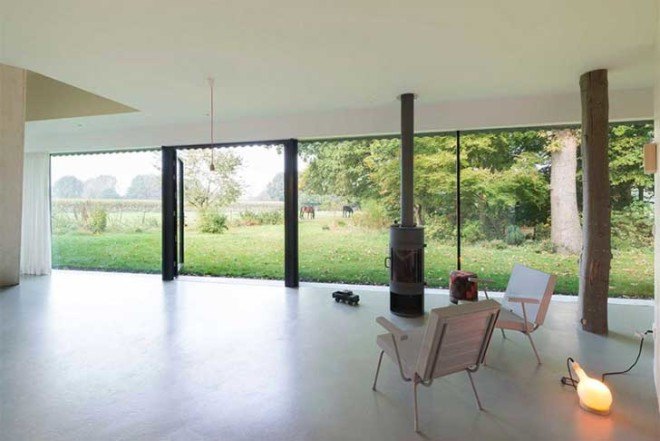 Barend Koolhaas, BK, triangular-plan house, House in Almen, energy-efficient, Dutch architecture, open plan interiors, natural light, rural views, glazed skin, heat exchanger