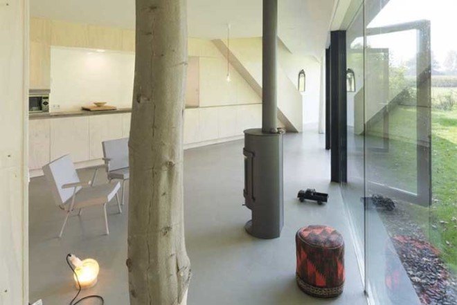 Barend Koolhaas, BK, triangular-plan house, House in Almen, energy-efficient, Dutch architecture, open plan interiors, natural light, rural views, glazed skin, heat exchanger