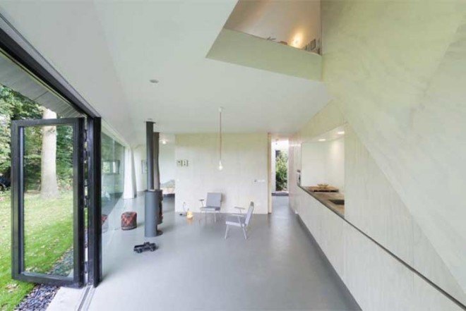 Barend Koolhaas, BK, triangular-plan house, House in Almen, energy-efficient, Dutch architecture, open plan interiors, natural light, rural views, glazed skin, heat exchanger