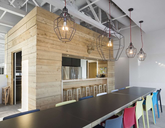STGM Architects, headquarters, Quebec, Canada, office space, natural lighting, water management, energy-efficient building, wooden facade, timber facade, solar wall, green architecture, prefab building, open-plan office, LED lights