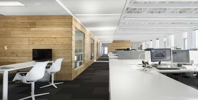STGM Architects, headquarters, Quebec, Canada, office space, natural lighting, water management, energy-efficient building, wooden facade, timber facade, solar wall, green architecture, prefab building, open-plan office, LED lights