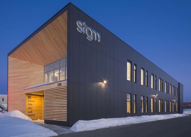STGM Architects, headquarters, Quebec, Canada, office space, natural lighting, water management, energy-efficient building, wooden facade, timber facade, solar wall, green architecture, prefab building, open-plan office, LED lights