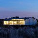 Alric Galindez, RM House, house on stilts, grassy Pampas, glazed facade, natural light, Mar de Ajó, floating house