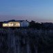 Alric Galindez, RM House, house on stilts, grassy Pampas, glazed facade, natural light, Mar de Ajó, floating house