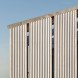 Alric Galindez, RM House, house on stilts, grassy Pampas, glazed facade, natural light, Mar de Ajó, floating house