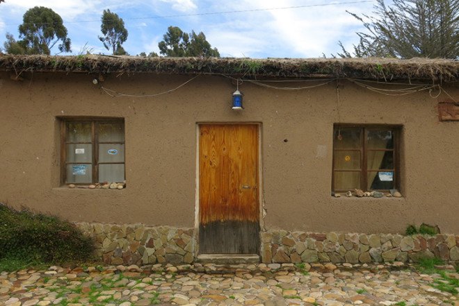 Ecolodge del Lago, Copacabana, Lake Titikaka, Adobe house, Lak'a Uta Architecture, Bolivia, vegetable garden, stepped terrace, green wall, solar water heater, stone sculptures