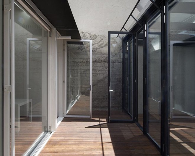 green house, Sean Godsell Architects, melbourne, australia, green renovation, automated sunscreen, aluminum screens, metal screens, aluminium, timber cottage, natural light , skylights, cathedral ceiling, inner courtyard