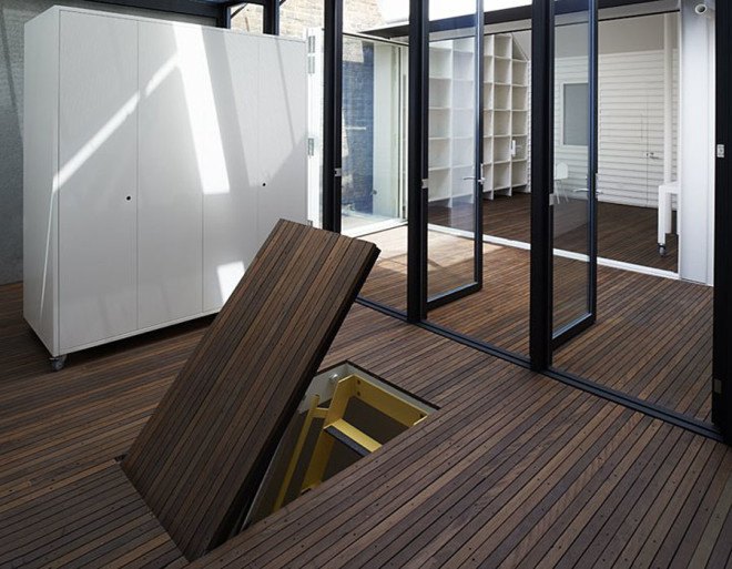 green house, Sean Godsell Architects, melbourne, australia, green renovation, automated sunscreen, aluminum screens, metal screens, aluminium, timber cottage, natural light , skylights, cathedral ceiling, inner courtyard