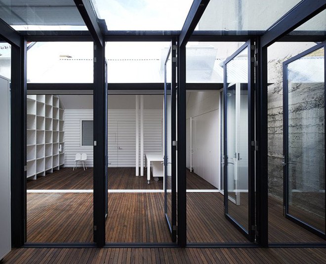 green house, Sean Godsell Architects, melbourne, australia, green renovation, automated sunscreen, aluminum screens, metal screens, aluminium, timber cottage, natural light , skylights, cathedral ceiling, inner courtyard