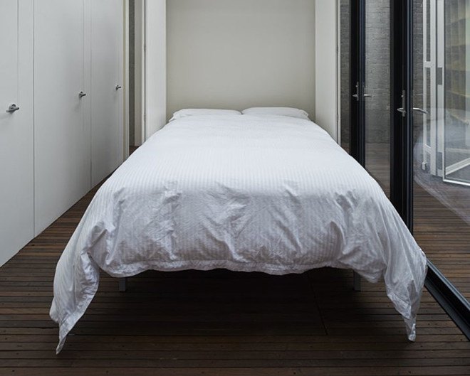 green house, Sean Godsell Architects, melbourne, australia, green renovation, automated sunscreen, aluminum screens, metal screens, aluminium, timber cottage, natural light , skylights, cathedral ceiling, inner courtyard