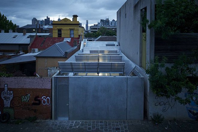 green house, Sean Godsell Architects, melbourne, australia, green renovation, automated sunscreen, aluminum screens, metal screens, aluminium, timber cottage, natural light , skylights, cathedral ceiling, inner courtyard