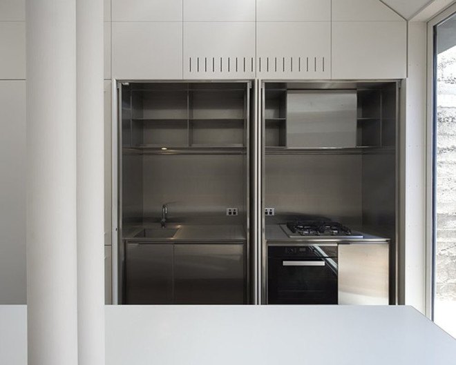 green house, Sean Godsell Architects, melbourne, australia, green renovation, automated sunscreen, aluminum screens, metal screens, aluminium, timber cottage, natural light , skylights, cathedral ceiling, inner courtyard