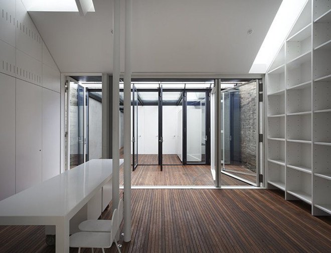 green house, Sean Godsell Architects, melbourne, australia, green renovation, automated sunscreen, aluminum screens, metal screens, aluminium, timber cottage, natural light , skylights, cathedral ceiling, inner courtyard
