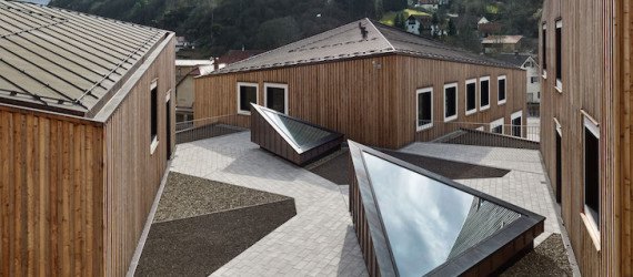 Barkow Leibinger, passive energy rating, Waischenfeld, Fraunhofer Institute for Integrated Circuits IIS, Fraunhofer Research Campus by Barkow Leibinger, standing seam copper, larch, patina, energy efficient, timber truss work, post and beam