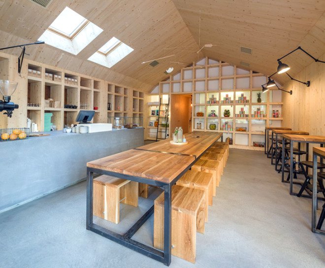 Frudisiac, Bucharest, metal clad cabin, cafe in a cabin, Not a Number Architects, contemporary cafe, spruce panels, spruce, natural light, skylights,