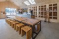 Frudisiac, Bucharest, metal clad cabin, cafe in a cabin, Not a Number Architects, contemporary cafe, spruce panels, spruce, natural light, skylights,
