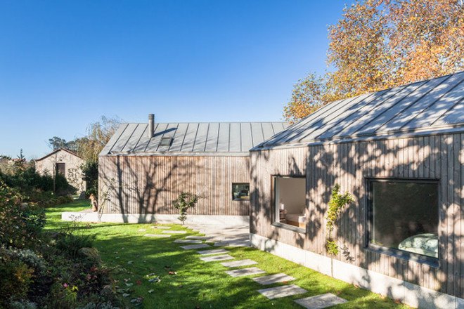 PROD Arquitectura, Portugal, House of Four Houses, green architecture, pitched roof, vernacular architecture, natural light, mezzanine, deck terrace, mobile partitions, glass-to-ceiling windows