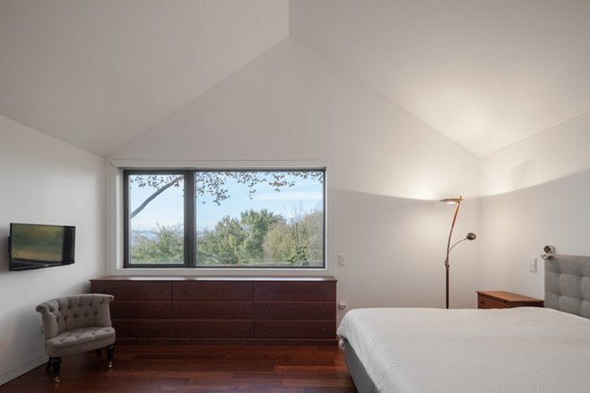 PROD Arquitectura, Portugal, House of Four Houses, green architecture, pitched roof, vernacular architecture, natural light, mezzanine, deck terrace, mobile partitions, glass-to-ceiling windows