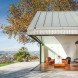 PROD Arquitectura, Portugal, House of Four Houses, green architecture, pitched roof, vernacular architecture, natural light, mezzanine, deck terrace, mobile partitions, glass-to-ceiling windows